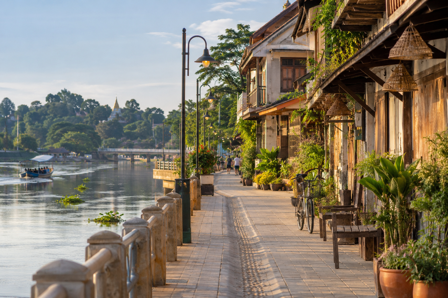 Quiet Uthai Thani riverside street during a private van route