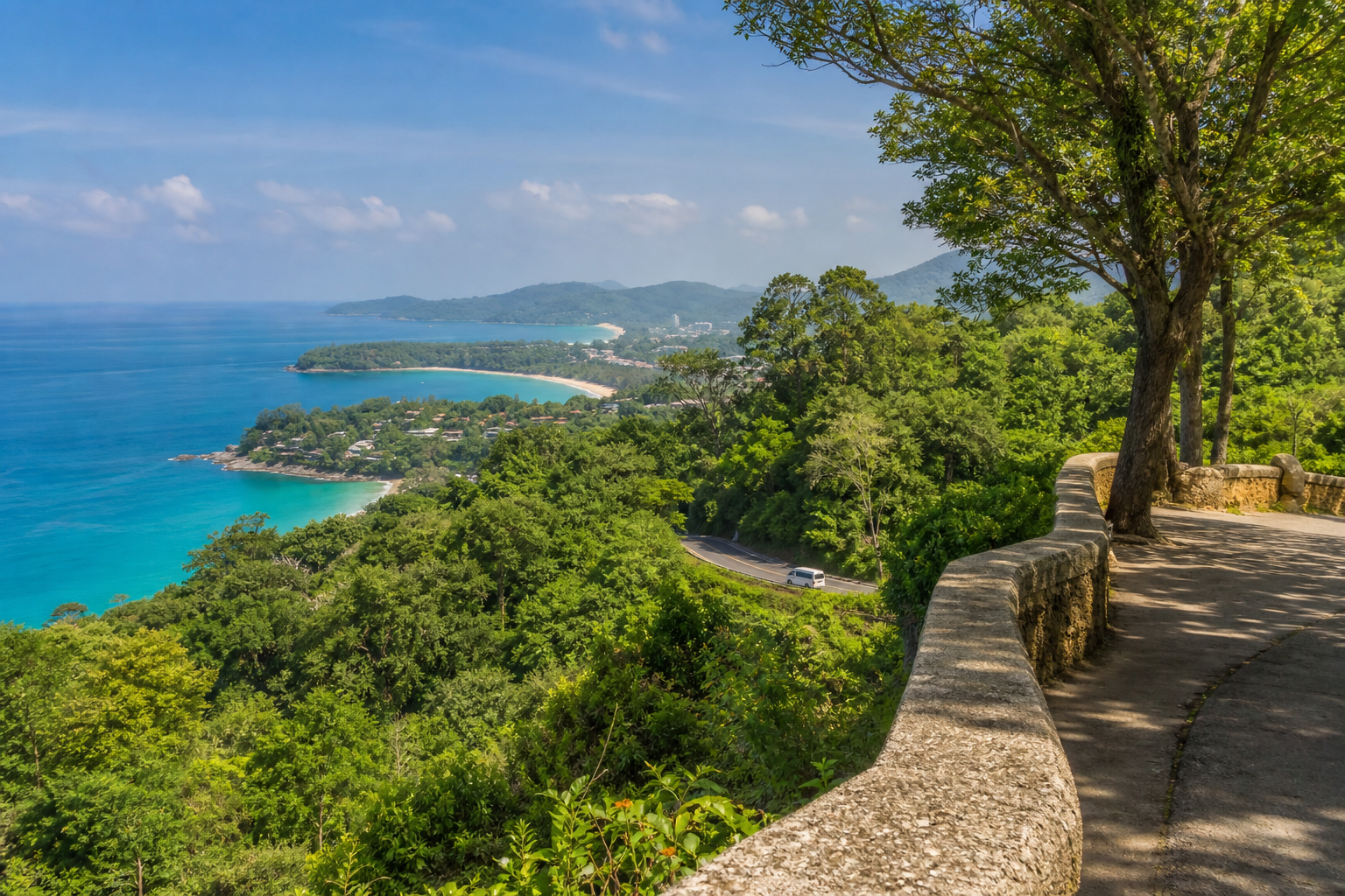 Phuket coastal viewpoint with sea and green hills on a private van route