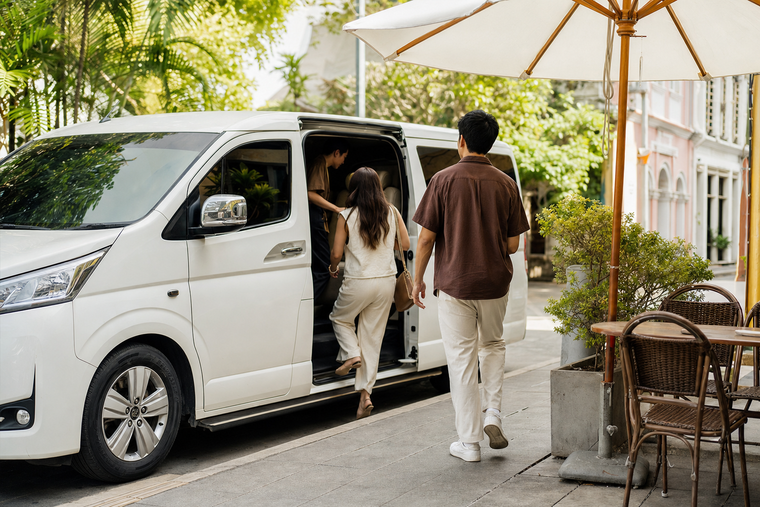 Travelers returning to a private van during a relaxed Phuket route
