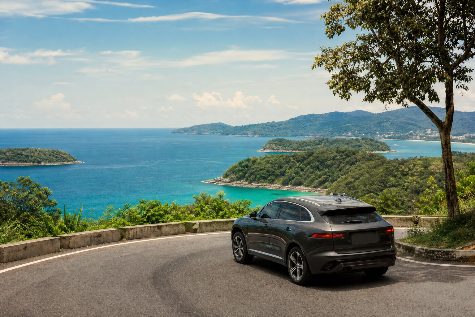 Phuket coastal viewpoint with sea and green hills on a private van route