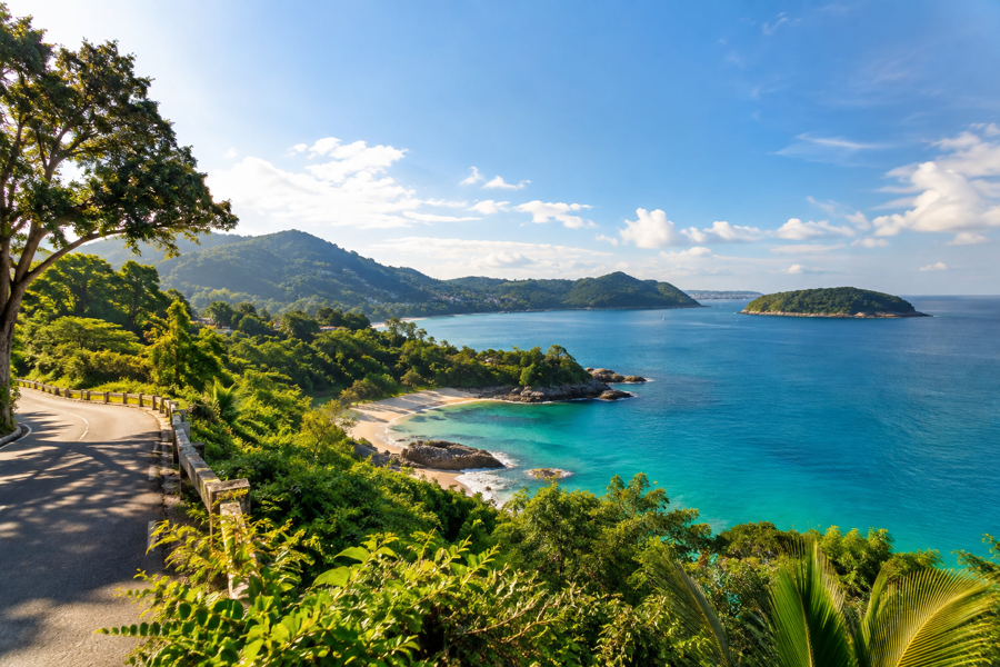 Phuket coastal viewpoint with sea and green hills on a private van route