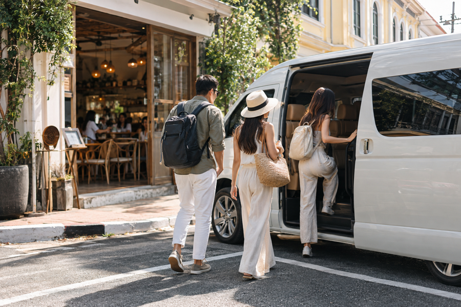 Travelers returning to a private van during a relaxed Phuket route